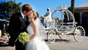 Melissa and Larry share a moment before riding away in Cinderella's Coach. www.disneyweddings.com