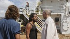 LOST - "Ji Yeon" - Juliet is forced to reveal some  startling news to Jin when Sun threatens to move to Locke's camp.  Meanwhile, Sayid and Desmond begin to get an idea of the freighter  crew's mission when they meet the ship's Captain, on "Lost,"  THURSDAY, MARCH 13 (9:00-10:02 p.m., ET) on the ABC Television Network.  (ABC/MARIO PEREZ)HENRY IAN CUSICK, (TOP BACKGROUND) ZOE BELL, NAVEEN  ANDREWS, MARC VANN