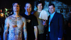 67256_0226 -- JIMMY KIMMEL LIVE -- Emmy-winning comedian Jimmy Kimmel brings his talents to Late-Night television with "Jimmy Kimmel Live," a distinctive Late-Night talk show he hosts as well as executive-produces -- along with Daniel Kellison -- for the ABC Television Network. Travis Barker from Blink 182 is the guest co-host for Wednesday, November 26 (12:05-1:05 a.m., ET/PT, following &Ograve;Nightline&Oacute;). Featured guests include actor Bryan Cranston (&Ograve;Malcolm in the Middle&Oacute;),  4-year-old football expert Jackson Kilburg and musical guests Blink 182. (ABC/RANDY TEPPER) BLINK 182, JIMMY KIMMEL