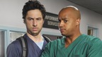 SCRUBS - "My Finale" - J.D. plans to say goodbye to Sacred Heart, but will his final day stand up to his fantasy of scoring a hug from Dr. Cox or learning the Janitor's real name? Meanwhile, when random furnishings from Elliot's apartment turn up in J.D.'s place, it becomes clear that she finally plans to take their relationship to a whole new level, on the season finale of "Scrubs," WEDNESDAY, MAY 6 (8:00-9:00 p.m., ET), on the ABC Television Network. (ABC/RICHARD CARTWRIGHT)  ZACH BRAFF, DONALD FAISON