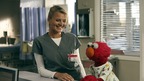SCRUBS - "My ABC's" - J.D. learns the hard way that not even Elmo can teach the gift of compassion to those who don't care to learn (Sesame Workshop's "Muppets" guest star), and intern Katie scams Elliot to land a spot on Turk's new research project team, on "Scrubs," TUESDAY, JANUARY 20 (9:00-9:30 p.m., ET), on the ABC Television Network. (ABC/DANNY FELD) ELIZA COUPE, ELMO