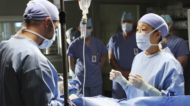 GREY'S ANATOMY - "Stand By Me" - Cristina, unable to concentrate for her first solo surgery, drops a bomb on everyone when she explains that Izzie has cancer and it's bad. Then she's able to operate, on "Grey's Anatomy," THURSDAY, MARCH 19 (9:00-10:02 p.m., ET) on the ABC Television Network. (ABC/CRAIG SJODIN) CHANDRA WILSON, JUSTIN CHAMBERS, SANDRA OH