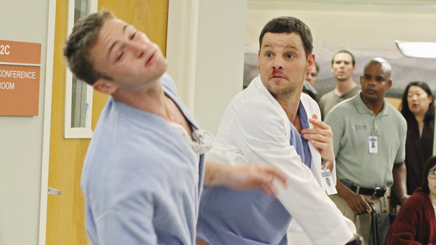 GREY'S ANATOMY - "Sympathy for the Parents" - When Alex's younger brother, Aaron, shows up at Seattle Grace-Mercy West with a hernia, it's up to Alex to get Bailey's approval for his pro bono surgery. Matters are further complicated when Aaron discloses that his family has not heard from Alex since he arrived in Seattle, and parts of Alex's past long kept secret are revealed to his friends and fellow doctors, on "Grey's Anatomy," THURSDAY, APRIL 1 (9:00-10:01 p.m., ET) on the ABC Television Network. (ABC/RON TOM)JAKE MCLAUGHLIN, JUSTIN CHAMBERS