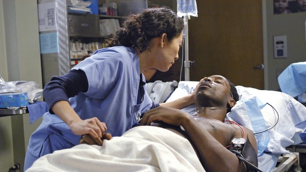 GREY'S ANATOMY - In the first hour of part two of the season finale of ABC's "Grey's Anatomy" -- "Deterioration of the Fight or Flight Response" -- Izzie and George attend to Denny as the pressure increases to find him a new heart, Cristina suddenly finds herself in charge of an ER, and Derek grapples with the realization that the life of a friend is in his hands. In the second hour, "Losing My Religion," Richard goes into interrogation mode about a patient's condition, Callie confronts George about his feelings for her, and Meredith and Derek meet about Doc. Part two of the season finale of "Grey's Anatomy" airs MONDAY, MAY 15 (9:00-11:00 p.m., ET) on the ABC Television Network. (ABC/GALE ADLER)SANDRA OH, ISAIAH WASHINGTON