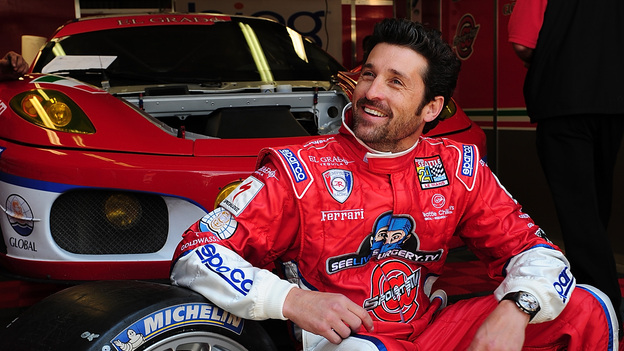 LE MANS, FRANCE - JUNE 11:  Patrick Dempsey relaxes in the garage area during practice and qualifying for the 77th running of the Le Mans 24 Hour race at the Circuit des 24 Heures du Mans on June 11, 2009 in Le Mans, France.  (Photo by Rick Dole/Getty Images)