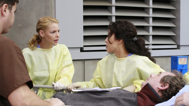 GREY'S ANATOMY - "Crash Into Me -- Part One" - An ambulance crash endangers the lives of the paramedics involved, as Meredith and the Chief work on-site to save them, Bailey treats a patient who refuses her help, and Ava returns for Alex and meets his other girlfriend in the process, on "Grey's Anatomy," THURSDAY, NOVEMBER 22 (9:00-10:02 p.m., ET) on the ABC Television Network. (ABC/RON TOM)KATHERINE HEIGL, SANDRA OH, JOHN BILLINGSLEY