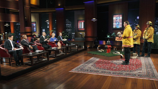 SHARK TANK -"Episode 204" -- Tempers flare when guest Shark Mark Cuban urges the entrepreneurs to stop negotiating with the other Sharks if they even want a chance to make a business deal with him. In this episode, a fireman from Arkansas brings an invention to the Shark Tank that could make millions and save lives; after creating an eco-friendly way to listen to music on the go, a duo from Chicago hope the Sharks will want to invest; a feisty, combative entrepreneur from Montclair, New Jersey seeks to cash in on the lucrative wedding business; and a man from Oklahoma hopes the Sharks will smell the money when he pitches his unique male-oriented brand of candles, on "Shark Tank," FRIDAY, MAY 6 (8:00-9:00 p.m., ET) on the ABC Television Network. (ABC/CRAIG SJODIN)MARK CUBAN, DAYMOND JOHN, KEVIN O'LEARY, BARBARA CORCORAN, ROBERT HERJAVEC, JEFF STROOPE (HYCONN LLC.)