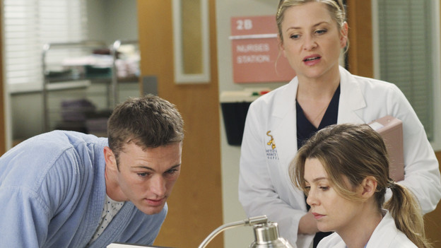 GREY'S ANATOMY - "Sympathy for the Parents" - When Alex's younger brother, Aaron, shows up at Seattle Grace-Mercy West with a hernia, it's up to Alex to get Bailey's approval for his pro bono surgery. Matters are further complicated when Aaron discloses that his family has not heard from Alex since he arrived in Seattle, and parts of Alex's past long kept secret are revealed to his friends and fellow doctors, on "Grey's Anatomy," THURSDAY, APRIL 1 (9:00-10:01 p.m., ET) on the ABC Television Network. (ABC/RON TOM)JAKE MCLAUGHLIN, JESSICA CAPSHAW, ELLEN POMPEO