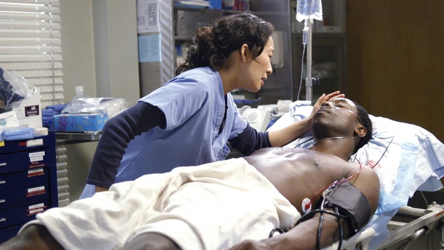 GREY'S ANATOMY - In the first hour of part two of the season finale of ABC's "Grey's Anatomy" -- "Deterioration of the Fight or Flight Response" -- Izzie and George attend to Denny as the pressure increases to find him a new heart, Cristina suddenly finds herself in charge of an ER, and Derek grapples with the realization that the life of a friend is in his hands. In the second hour, "Losing My Religion," Richard goes into interrogation mode about a patient's condition, Callie confronts George about his feelings for her, and Meredith and Derek meet about Doc. Part two of the season finale of "Grey's Anatomy" airs MONDAY, MAY 15 (9:00-11:00 p.m., ET) on the ABC Television Network. (ABC/GALE ADLER)SANDRA OH, ISAIAH WASHINGTON