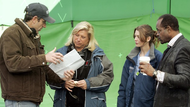 GREY'S ANATOMY - "Walk on Water" - Producer/director Rob Corn, producer/technical advisor Linda Klein (center left), and Ellen Pompeo (center right) review notes while shooting "Grey's Anatomy" on location at the Santa Anita Park in Arcadia, California. (ABC/VIVIAN ZINK)