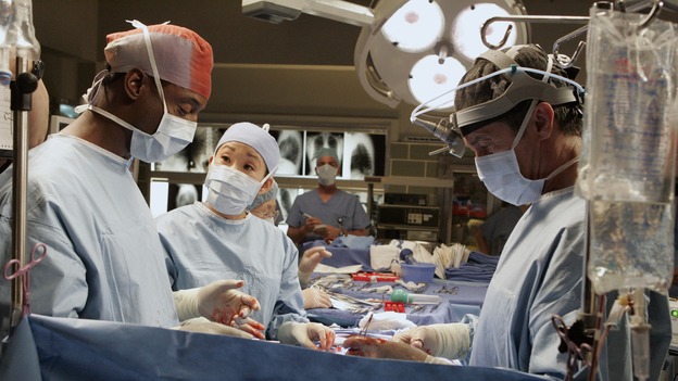 GREY'S ANATOMY - "Time After Time" - Izzie faces her past and finds comfort in George, while Alex becomes more attached to Jane Doe (Elizabeth Reaser), Meredith and Derek question their own status, and Cristina resolves to fight for her relationship with Burke -- despite her past with Colin Marlow (Roger Rees) -- on "Grey's Anatomy," THURSDAY, APRIL 19 (9:00-10:01 p.m., ET) on the ABC Television Network. (ABC/VIVIAN ZINK)ISAIAH WASHINGTON, SANDRA OH, ROGER REES