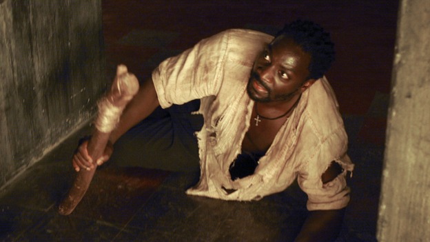 LOST -- "Live Together, Die Alone" - After discovering something odd just offshore, Jack and Sayid come up with a plan to confront "The Others" and hopefully get Walt back. Meanwhile, Eko and Locke come to blows as Locke makes a potentially cataclysmic decision regarding the "button" and the hatch, on the season finale of "Lost," WEDNESDAY, MAY 24 (9:00-11:00 p.m., ET), on the ABC Television Network. (ABC/MARIO PEREZ)ADEWALE AKINNUOYE-AGBAJE