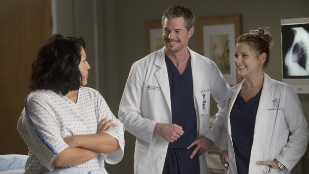 GREY'S ANATOMY - "Don't Deceive Me (Please Don't Go)" - Derek breaks ground on his Alzheimer's clinical trial and Meredith can't help but feel left out; Bailey's attempt to take the hospital into the age of new media with live tweets from the OR does not go over well with the Chief; and Callie, Mark and Arizona must learn to navigate through the pregnancy together, which starts off with Callie driving her new obstetrician (guest star Rachael Taylor) crazy, on "Grey's Anatomy," THURSDAY, FEBRUARY 3 (9:00-10:01 p.m., ET) on the ABC Television Network. (ABC/RANDY HOLMES)SARA RAMIREZ, ERIC DANE, JESSICA CAPSHAW