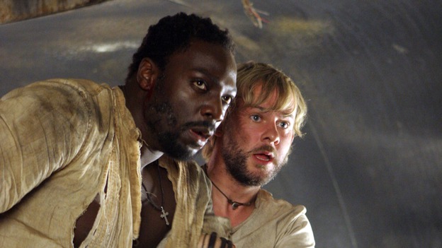 LOST -- "Live Together, Die Alone" - After discovering something odd just offshore, Jack and Sayid come up with a plan to confront "The Others" and hopefully get Walt back. Meanwhile, Eko and Locke come to blows as Locke makes a potentially cataclysmic decision regarding the "button" and the hatch, on the season finale of "Lost," WEDNESDAY, MAY 24 (9:00-11:00 p.m., ET), on the ABC Television Network. (ABC/MARIO PEREZ)ADEWALE AKINNUOYE-AGBAJE, DOMINIC MONAGHAN