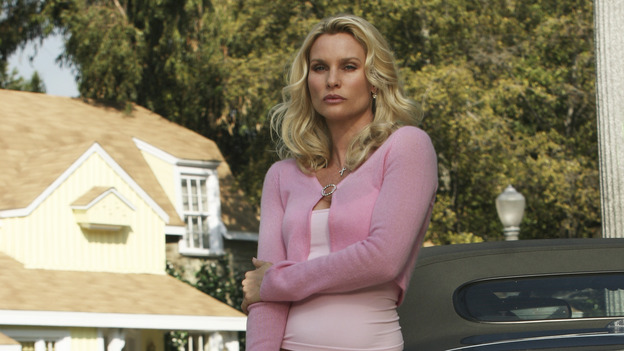 DESPERATE HOUSEWIVES - "Move On" - Edie organizes a neighborhood search for the missing Mrs. Huber, just as the absent busybody's sister (guest star Harriet Sansom Harris) arrives on Wisteria Lane. Meanwhile, Bree resigns herself to her marital state and asks an attractive pharmacist (Tony Award-winning actor Roger Bart) on a date; Susan's ex, Karl (guest star Richard Burgi), suddenly reappears in her life; Lynette fears that Tom is attracted to the new nanny (guest star Marla Sokoloff); and Gabrielle sinks to new depths - she gets a job -- on "Desperate Housewives," SUNDAY, JANUARY 9 (9:00-10:00 p.m., ET), on the ABC Television Network. (ABC/SCOTT GARFIELD)NICOLLETTE SHERIDAN
