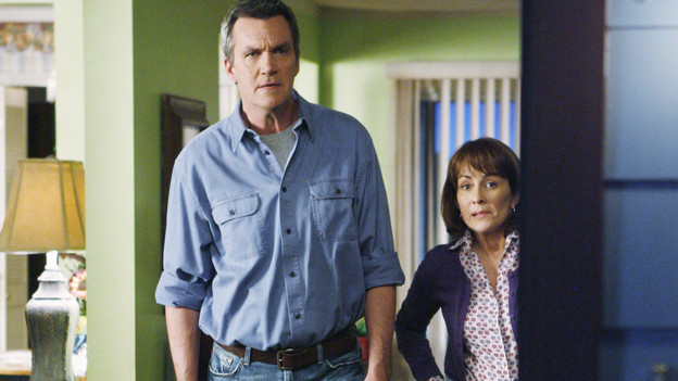 THE MIDDLE - "The Front Door" - Frankie is caught in the middle when Axl accidentally breaks down the front door, and Mike insists that he fix it - which could leave the Heck house wide open for days.  Meanwhile, Frankie must sell a car within a week or be forced to wear a dog suit outside the lot, and it's school picture time for Sue, who has never had a flattering photo taken of her, on "The Middle," WEDNESDAY, NOVEMBER 4 (8:30-9:00 p.m., ET) on the ABC Television Network. (ABC/ADAM LARKEY)NEIL FLYNN, PATRICIA HEATON