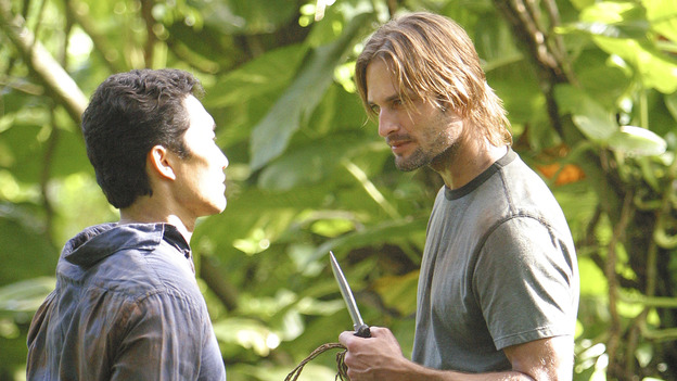 LOST - "...In Translation" - When the raft the survivors have been building mysteriously burns down, Michael is convinced that Jin is responsible for the sabotage, which only further escalates their rivalry. Meanwhile, Sun stuns her fellow survivors with a surprising revelation, and Boone gives Sayid a warning about Shannon, on "Lost," WEDNESDAY, FEBRUARY 23 (8:00-9:01 p.m., ET), on the ABC Television Network. (ABC/MARIO PEREZ) DANIEL DAE KIM, JOSH HOLLOWAY