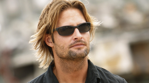 LOST - "House of the Rising Sun" - Walt and the others are shocked when Michael is brutally beaten, but only the non-English-speaking Jin and Sun know the truth behind the attack. Meanwhile Kate, Jack, Sawyer and Sayid argue about where the survivors should camp -- on the beach, where they're more likely to be seen, or in a remote inland valley where fresh water abounds; and Locke discovers Charlie's secret, on "Lost," WEDNESDAY, OCTOBER 27 (8:00-9:00 p.m., ET), on the ABC Television Network. (ABC/MARIO PEREZ) JOSH HOLLOWAY