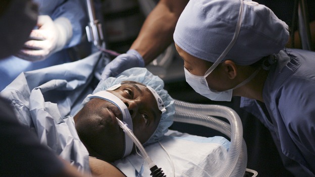 GREY'S ANATOMY - In the first hour of part two of the season finale of ABC's "Grey's Anatomy" -- "Deterioration of the Fight or Flight Response" -- Izzie and George attend to Denny as the pressure increases to find him a new heart, Cristina suddenly finds herself in charge of an ER, and Derek grapples with the realization that the life of a friend is in his hands. In the second hour, "Losing My Religion," Richard goes into interrogation mode about a patient's condition, Callie confronts George about his feelings for her, and Meredith and Derek meet about Doc. Part two of the season finale of "Grey's Anatomy" airs MONDAY, MAY 15 (9:00-11:00 p.m., ET) on the ABC Television Network. (ABC/SCOTT GARFIELD)ISAIAH WASHINGTON, SANDRA OH