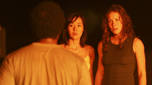 LOST - "...In Translation" - When the raft the survivors have been building mysteriously burns down, Michael is convinced that Jin is responsible for the sabotage, which only further escalates their rivalry. Meanwhile, Sun stuns her fellow survivors with a surprising revelation, and Boone gives Sayid a warning about Shannon, on "Lost," WEDNESDAY, FEBRUARY 23 (8:00-9:01 p.m., ET), on the ABC Television Network. (ABC/MARIO PEREZ) HAROLD PERRINEAU, YUNJIN KIM, EVANGELINE LILLY