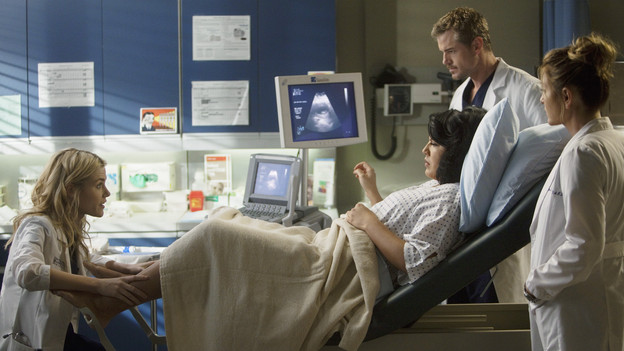 GREY'S ANATOMY - "Don't Deceive Me (Please Don't Go)" - Derek breaks ground on his Alzheimer's clinical trial and Meredith can't help but feel left out; Bailey's attempt to take the hospital into the age of new media with live tweets from the OR does not go over well with the Chief; and Callie, Mark and Arizona must learn to navigate through the pregnancy together, which starts off with Callie driving her new obstetrician (guest star Rachael Taylor) crazy, on "Grey's Anatomy," THURSDAY, FEBRUARY 3 (9:00-10:01 p.m., ET) on the ABC Television Network. (ABC/RANDY HOLMES)RACHAEL TAYLOR, SARA RAMIREZ, ERIC DANE, JESSICA CAPSHAW