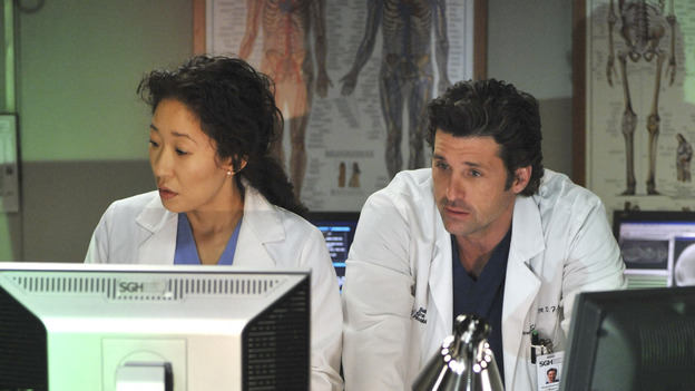 GREY'S ANATOMY- "Here Comes the Flood" - Cristina and&nbsp;Derek check a patient's test results, on "Grey's Anatomy," THURSDAY, OCTOBER 9 (9:00-10:01 p.m., ET) on the ABC Television Network. (ABC/ERIC McCANDLESS) SANDRA OH, DANIEL J. TRAVANTI, PATRICK DEMPSEY