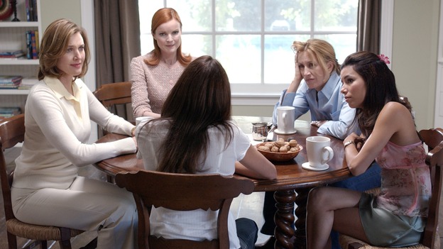 DESPERATE HOUSEWIVES - Looking down on her friends and family isn't a way of life for Mary Alice Young. It's a way of death. One day, in her perfect house, in the loveliest of suburbs, Mary Alice ended it all. Now she's taking us into the lives of her family, friends and neighbors, commenting from her elevated POV. Her husband's acting suspicious, the neighbors are talking, and her girlfriends are wondering why one of their own would do something so rash- and so messy. From her unique vantage point, Mary Alice sees more now than she ever did alive and she's planning to share all the delicious secrets that hide behind every neighbor's closed door in this seemingly perfect American suburb. The writer of "Melrose Place" and "General Hospital" (Executive Producer Charles Pratt Jr.) has helped create a primetime soap with a truly contemporary take on happily ever after. (ABC/RON TOM) BRENDA STRONG, TERI HATCHER, MARCIA CROSS, FELICITY HUFFMAN, EVA LONGORIA