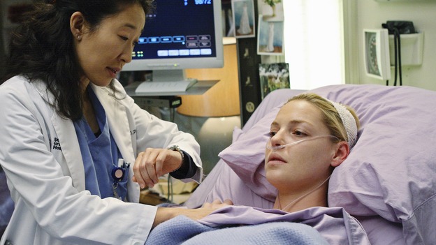 GREY'S ANATOMY - "Sweet Surrender" - Cristina examines Izzie after she collapsed due to her cancer treatments, on "Grey's Anatomy," THURSDAY, APRIL 23 (9:00-10:02 p.m., ET) on the ABC Television Network. (ABC/CRAIG SJODIN) SANDRA OH, KATHERINE HEIGL