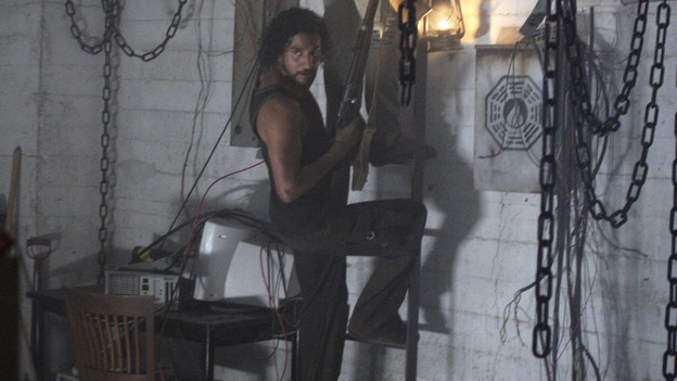 LOST - "Enter 77" - Locke, Sayid and Kate investigate a strange structure and its mysterious inhabitant. Meanwhile, Sawyer competes in a ping-pong competition to get back his belongings, on "Lost," WEDNESDAY, MARCH 7 (10:00-11:00 p.m., ET), on the ABC Television Network. (ABC/MARIO PEREZ)EVANGELINE LILLY, NAVEEN ANDREWS