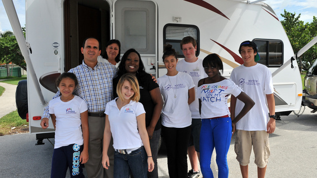 SECRET MILLIONAIRE - "Marcus Lemonis, Miami, FL" - CEO & Chairman of Camping World and Good Sam touches the lives of many when he returns to a very disadvantaged community of his Miami childhood hometown to secretly seek out those most in need. Over the course of seven days, this billion dollar business owner leaves his luxurious Chicago lifestyle and moves into a rundown trailer at welfare level wages. While there, he volunteers and gets to know some selfless heroes who are sacrificing their time, energy and money to provide a good home for young women at risk and to clothe children living in poverty. At week's end, Marcus gifts these amazing people with hundreds of thousands of dollars of his own money and confesses to having had "the single greatest experience of his life," on "Secret Millionaire," SUNDAY, AUGUST 5 (8:00-9:00 p.m., ET), on The ABC Television Network. (ABC/RODRIGO VARELA)MARCUS LEMONIS, JOWHARAH SANDERS, NVEEE KIDS