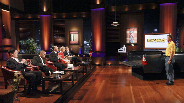 SHARK TANK - "Episode 307" - An artistic man from Chicago hopes the Sharks won't pussyfoot around but will see his cat drawing service as a worthy business investment. Another featured cat-themed business is a follow up story on CitiKitty from Season 2, Rebecca Rescate's product that potty trains cats. Also, a man from North Haven, CT needs to make the Sharks believe he has an education system that can teach anyone to be a better salesperson; a professional magician and Guinness World Record holder for card throwing, from Broadview Hills, OH presents his plan to bring his unique family-friendly brand of entertainment to Las Vegas; and a husband and father from Sparta, NC hopes to convince the Sharks to invest in his innovative cargo truck management system, a product he is proud to say is made in America, on "Shark Tank," FRIDAY, JANUARY 27 (8:00-9:00 p.m., ET) on the ABC Television Network. (ABC/RICHARD CARTWRIGHT)MARK CUBAN, DAYMOND JOHN, KEVIN O'LEARY, BARBARA CORCORAN, ROBERT HERJAVEC, DONNY MCCALL (INVIS-A-RACK)