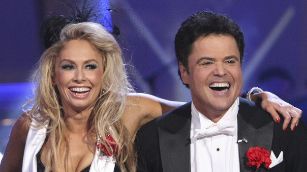 DANCING WITH THE STARS - "Episode 910" - In the final performance show, the couples competed against one another with three more dances. They each performed the last Ballroom or Latin round dance they have not yet performed on the show, as well as the always popular freestyle dance and then the megamix challenge. In the megamix, the three finalists faced off at the same time in a group number made up of three dance styles, the Viennese Waltz, the Samba and the Jive, all choreographed by "Dancing with the Stars" alum Nick Kosovich, airing MONDAY, NOVEMBER 23 (8:00-9:30 p.m., ET), on the ABC Television Network. (ABC/ADAM LARKEY)KYM JOHNSON, DONNY OSMOND