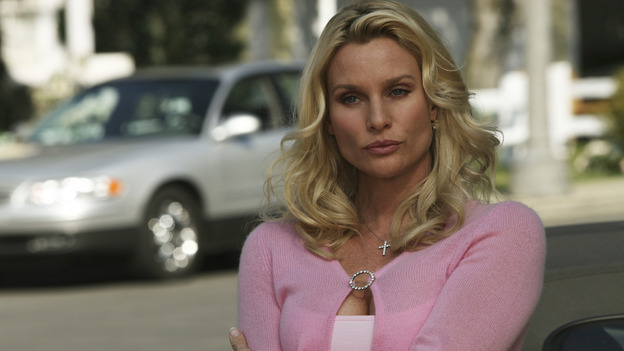 DESPERATE HOUSEWIVES - "Move On" - Edie organizes a neighborhood search for the missing Mrs. Huber, just as the absent busybody's sister (guest star Harriet Sansom Harris) arrives on Wisteria Lane. Meanwhile, Bree resigns herself to her marital state and asks an attractive pharmacist (Tony Award-winning actor Roger Bart) on a date; Susan's ex, Karl (guest star Richard Burgi), suddenly reappears in her life; Lynette fears that Tom is attracted to the new nanny (guest star Marla Sokoloff); and Gabrielle sinks to new depths - she gets a job -- on "Desperate Housewives," SUNDAY, JANUARY 9 (9:00-10:00 p.m., ET), on the ABC Television Network. (ABC/SCOTT GARFIELD)NICOLLETTE SHERIDAN