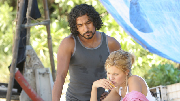 LOST - "Whatever the Case May Be" - Jack, Kate and Sawyer fight over possession of a newly discovered locked metal briefcase which might contain insights into Kate's mysterious past. Meanwhile, Sayid asks a reluctant Shannon to translate notes he took from the French woman, a rising tide threatens to engulf the fuselage and the entire beach encampment, and Rose and a grieving Charlie tentatively bond over Claire's baffling disappearance, on "Lost," WEDNESDAY, JANUARY 5 (8:00-9:00 p.m., ET), on the ABC Television Network.  (ABC/MARIO PEREZ) NAVEEN ANDREWS, MAGGIE GRACE