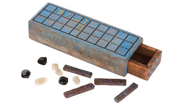 Senet gameboard used by Jacob and the Manin Black In the episode, "Across the Sea," a young Manin Black finds an intricately carved Senet gameboard on thebeach. He and Jacob frequently play this game throughouttheir years on the Island. Includes stone pieces and a woodenbox measuring 4 in. x 12 in. x 2 &frac12; in.Related content:EPISODE RECAP - "Across the Sea"