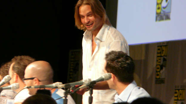 You know what gets a crowd going? Josh Holloway (Sawyer) joining the LOST panel! After a montage of Sawyer clips, Josh walked onto the stage to join castmates Jorge Garcia, Michael Emerson and Nestor Carbonell.  - Josh came out and then reminded Damon and Carlton about the taser episode ("A Tale of Two Cities").  - He then threatened Damon with a taser so he could get to the series finale script that Damon and Carlton had stashed away in a lockbox.  - Josh tasered Damon and took his key to the lockbox. He then told Carlton that he'd continue to taser his buddy over there, J.J. Abrams. Carlton replied that he tasered Damon Lindelof. "Linda who?" Josh exclaimed in full-on Sawyer mode.  - Josh was liberal with the Sawyer-inspired name-calling. He referred to Carlton as "Frankenstein."  - Josh opened the lockbox and tried to read the script. After much hesitation, an impatient Michael Emerson yelled, "You can't read, can you?"  - Michael proceeded to read the finale script, but the joke is that it was actually a script for Heroes.