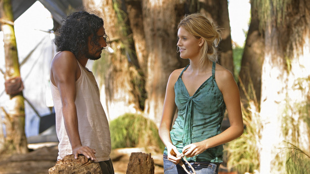 LOST - "...In Translation" - When the raft the survivors have been building mysteriously burns down, Michael is convinced that Jin is responsible for the sabotage, which only further escalates their rivalry. Meanwhile, Sun stuns her fellow survivors with a surprising revelation, and Boone gives Sayid a warning about Shannon, on "Lost," WEDNESDAY, FEBRUARY 23 (8:00-9:01 p.m., ET), on the ABC Television Network. (ABC/MARIO PEREZ) NAVEEN ANDREWS, MAGGIE GRACE