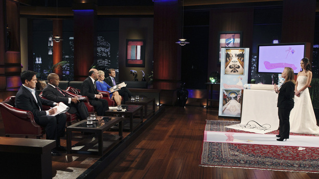 SHARK TANK -"Episode 204" -- Tempers flare when guest Shark Mark Cuban urges the entrepreneurs to stop negotiating with the other Sharks if they even want a chance to make a business deal with him. In this episode, a fireman from Arkansas brings an invention to the Shark Tank that could make millions and save lives; after creating an eco-friendly way to listen to music on the go, a duo from Chicago hope the Sharks will want to invest; a feisty, combative entrepreneur from Montclair, New Jersey seeks to cash in on the lucrative wedding business; and a man from Oklahoma hopes the Sharks will smell the money when he pitches his unique male-oriented brand of candles, on "Shark Tank," FRIDAY, MAY 6 (8:00-9:00 p.m., ET) on the ABC Television Network. (ABC/CRAIG SJODIN)MARK CUBAN, DAYMOND JOHN, KEVIN O'LEARY, BARBARA CORCORAN, ROBERT HERJAVEC, JULIE GOLDMAN (ORIGINAL RUNNER CO.)